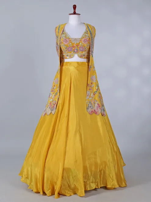 Yellow silk jacket style lehenga choli for haldi