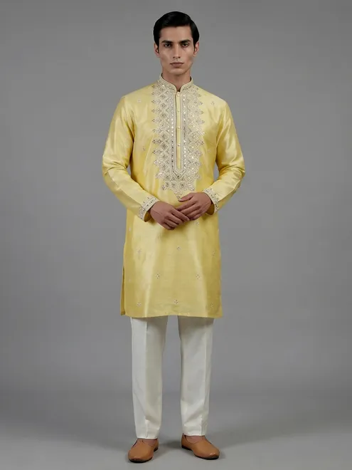 Yellow silk kurta suiit with aabla and embroidery design