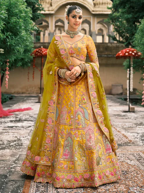 Yellow silk lehenga choli for haldi celebration