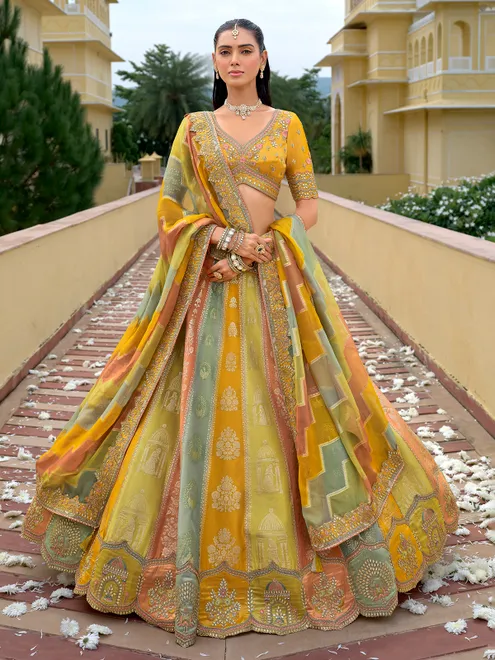 Yellow silk lehenga choli for wedding celebration