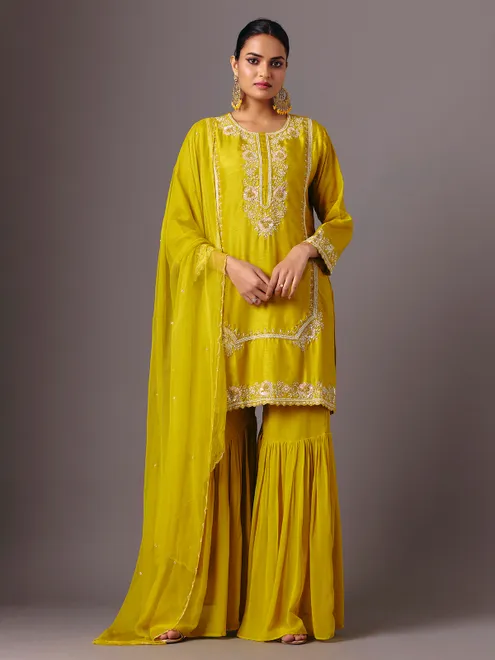 Yellow silk round neck traditional sharara suit