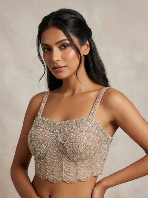 Beige designer net blouse with cutdana embellishments