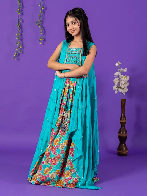 Green silk lehenga choli with gorgeaous shrug