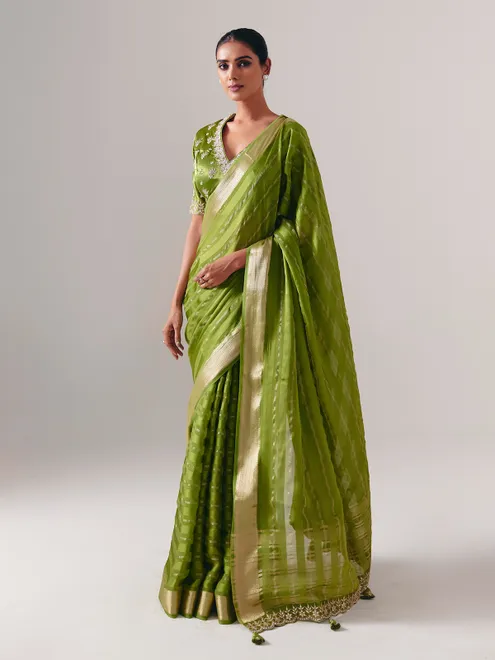 Green silk saree with heavy festive blouse