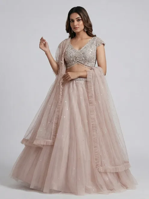 Peach net cutdana and sequins worked lehenga choli for reception