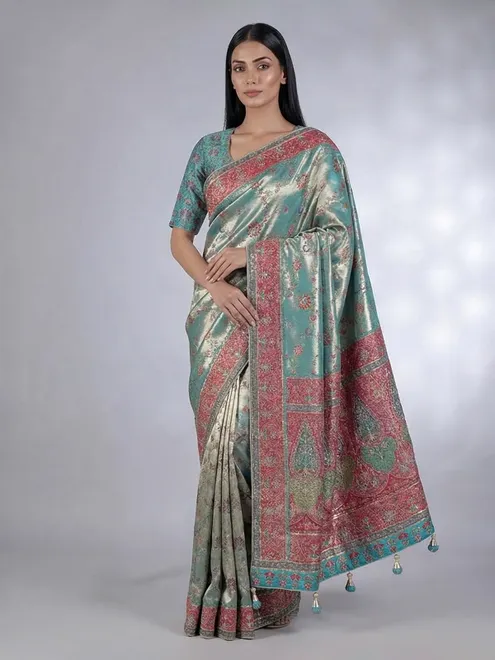 Pastel aqua tissue silk contrast border heavy work saree