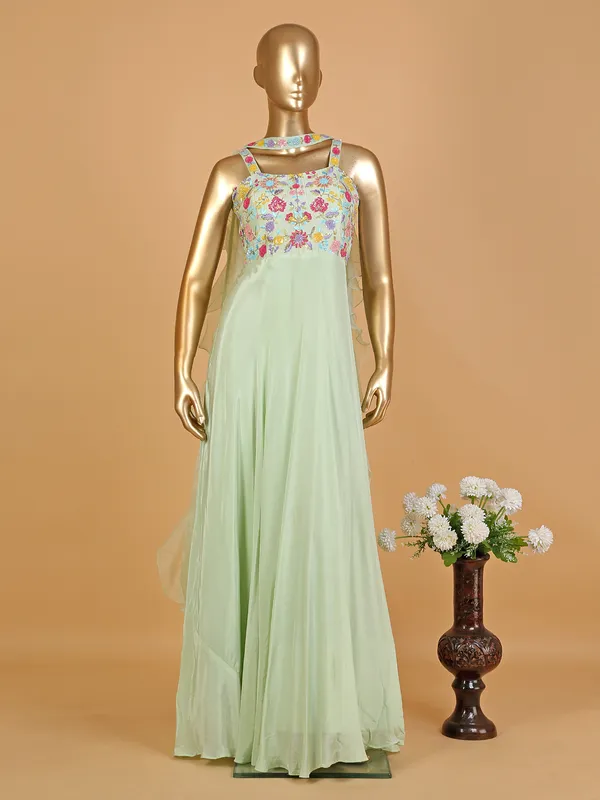 Light green floor length suit with choker dupatta