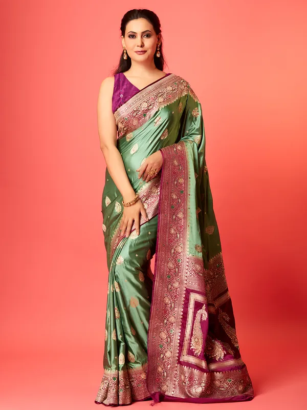 Pista green silk saree with contrast border