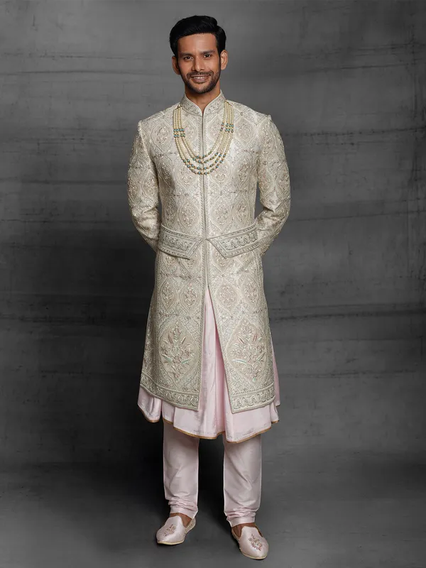 Dual layer silk sherwani in beige color for wedding event