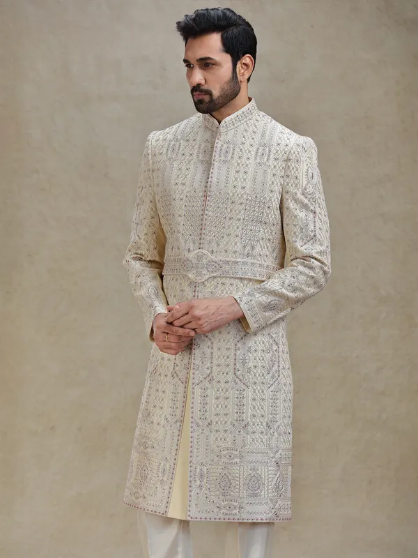 Gold coloured embroideried silk long sherwani