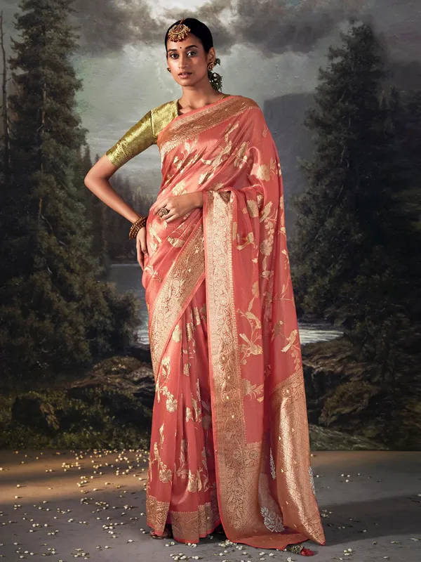 Trendy peach zari weaving saree