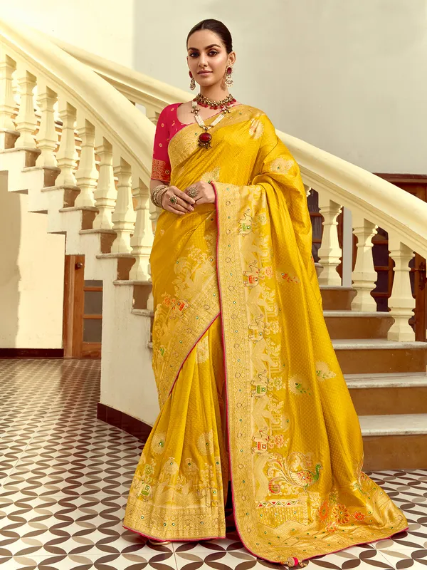 Yellow silk saree with zari work for reception wear