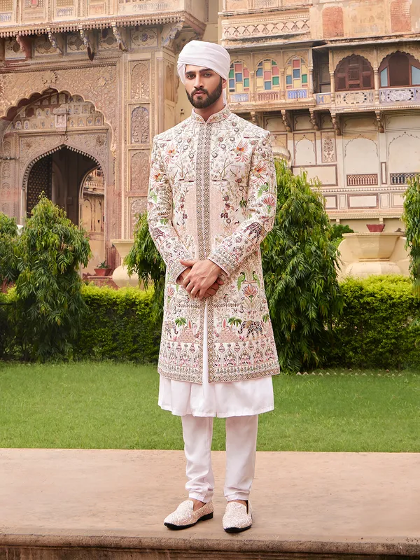 Amazing peach raw silk sherwani for groom