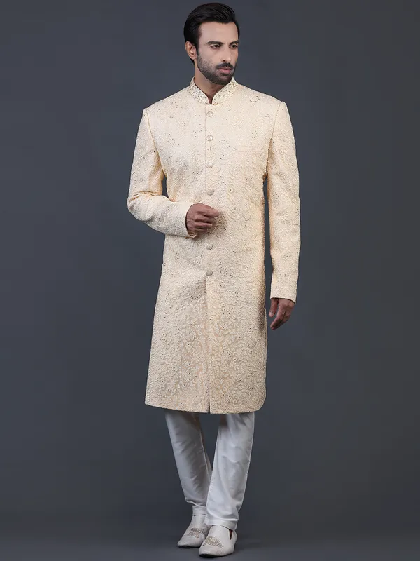 Amazing yellow net sherwani for wedding