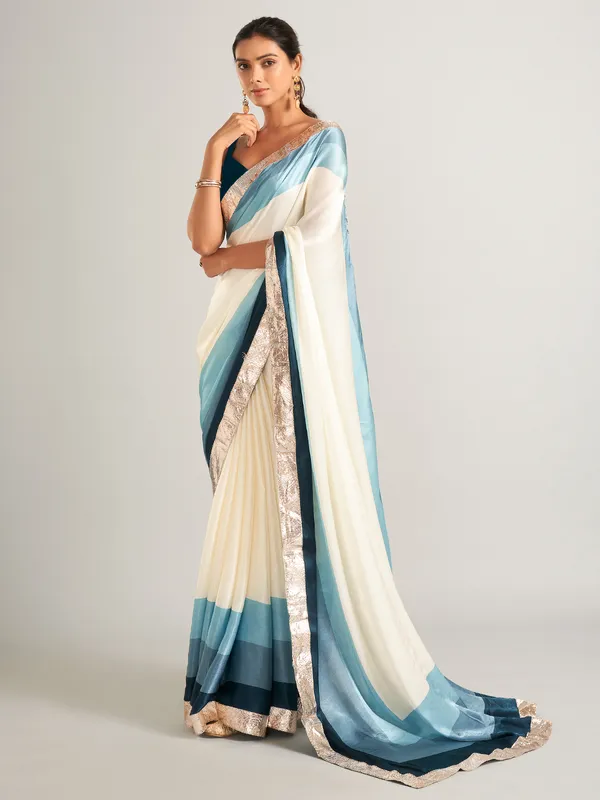 Appealing cream and blue masru silk saree