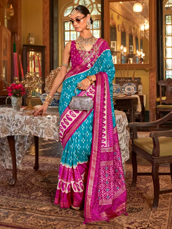 Aqua silk printed saree with contrast blouse