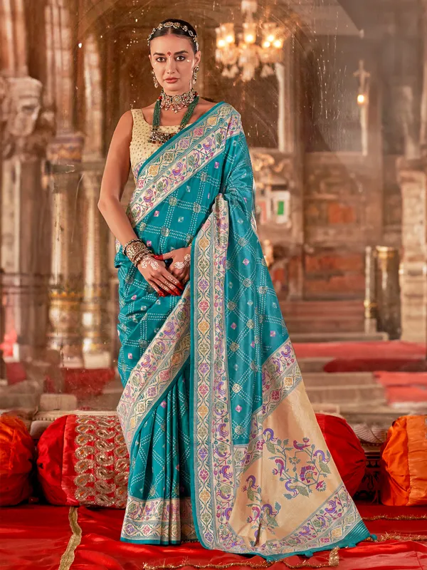 Aqua silk saree with bandhej print