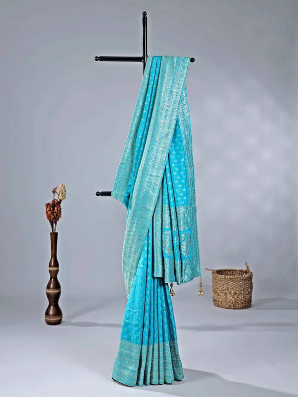 Aqua silk saree with subtle zari highlights