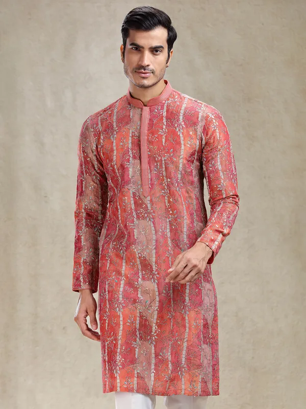 Artisanal grace rust orange kurta suit in intricate work