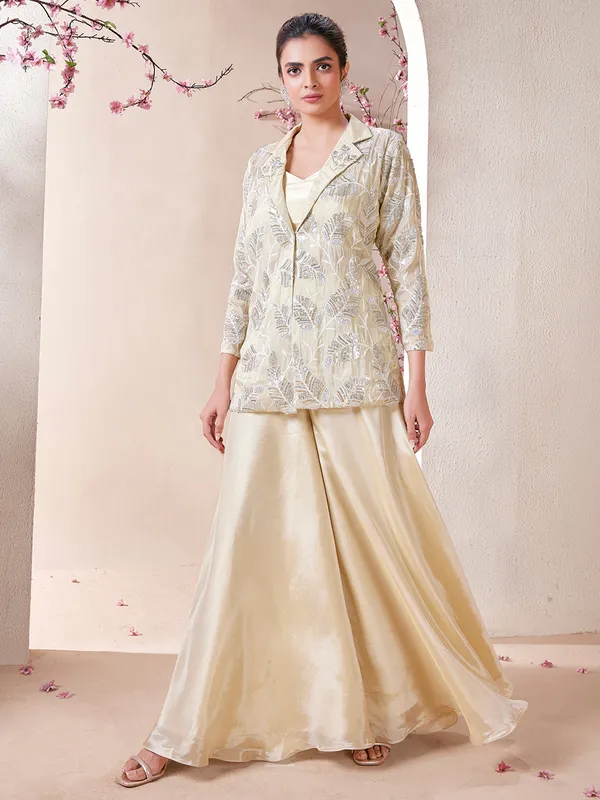 Attractive cream tissue silk palazzo salwar suit