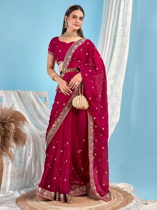 Awesome embroidery magenta georgette saree