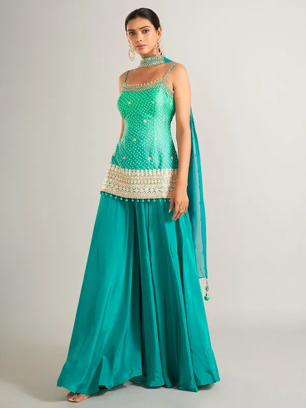 Bandhani print silk rama green palazzo salwar suit