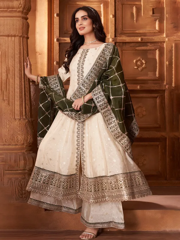 Beautiful cream silk palazzo suit with dupatta