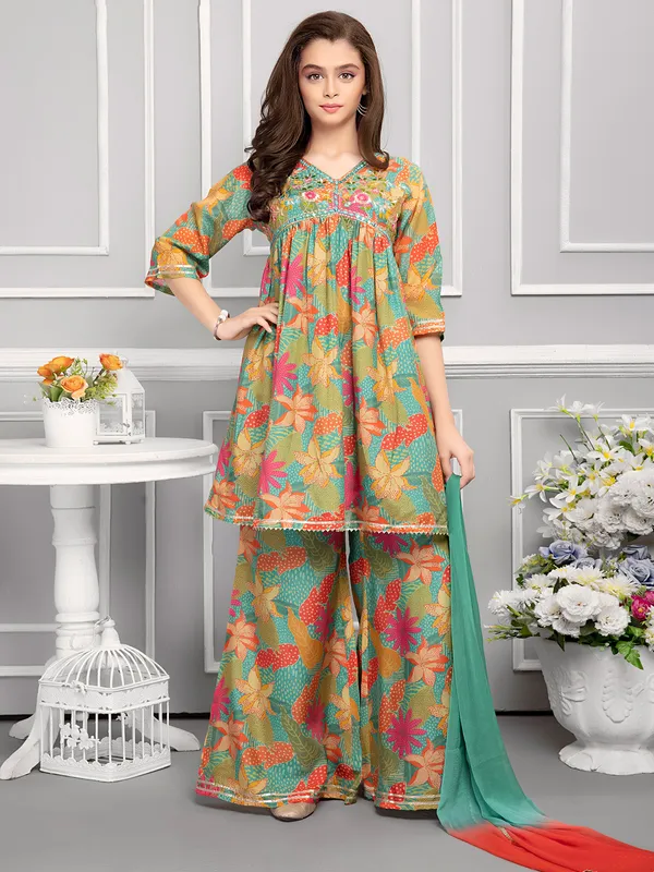 Beautiful printed pista green silk palazzo salwar suit