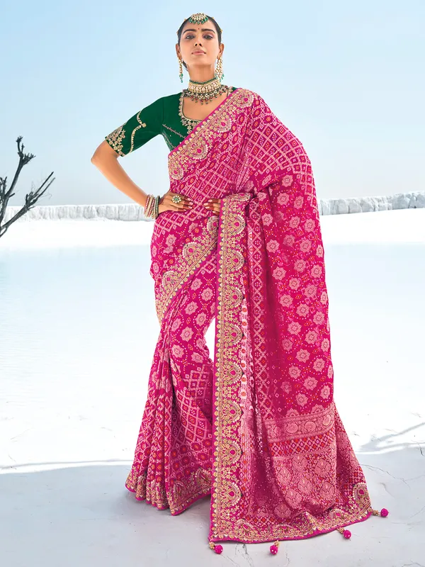 Beautiful rani color bandhej saree