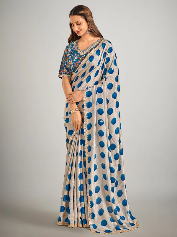 Beige and blue crepe silk saree