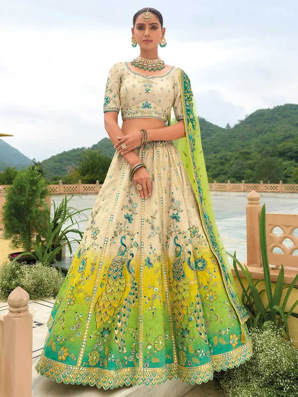 Beige and green silk wedding wear lehenga choli