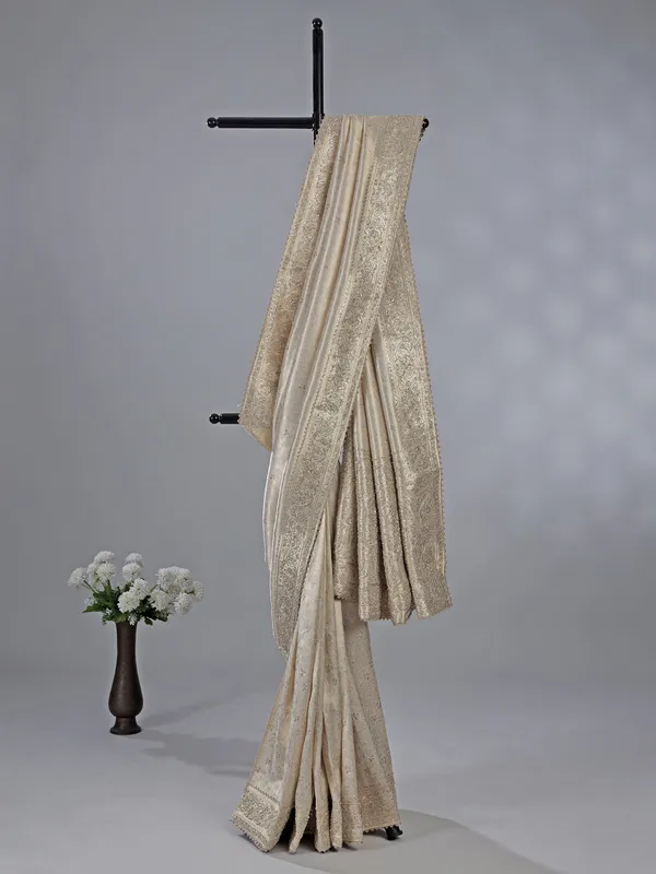 Beige kanjivaram silk saree with zari weaving