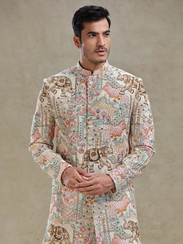 Beige long indo-western in colourful embroidery