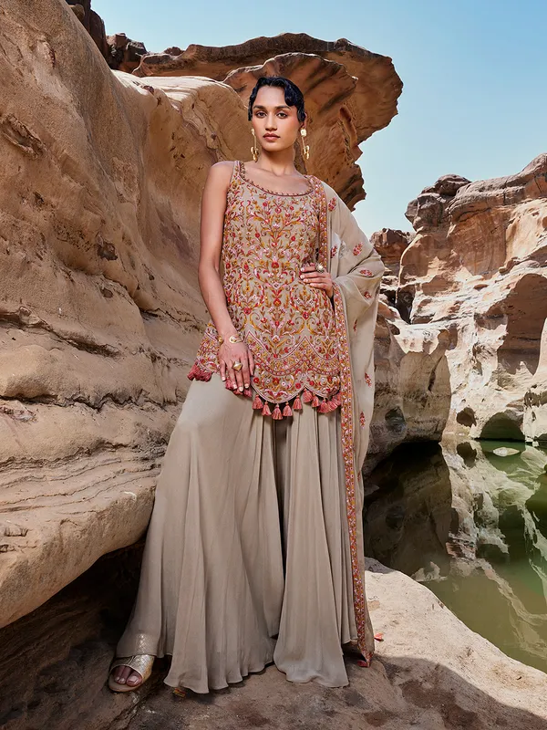 Beige palazzo salwar suit in georgette