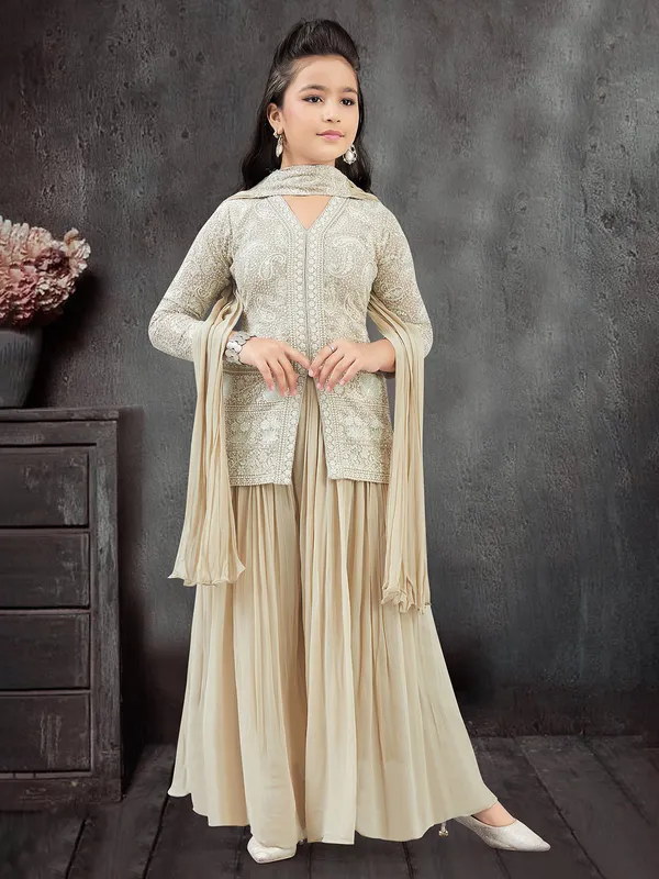 Beige palazzo suit in soft georgette