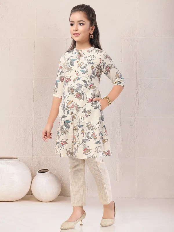 Beige printed salwar suit for girls