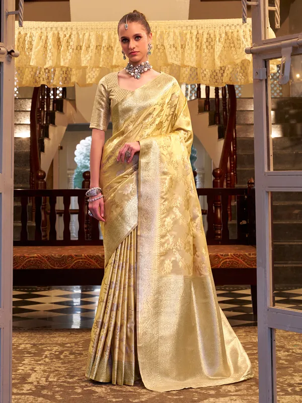 Beige satin silk saree with rich zari embellishment