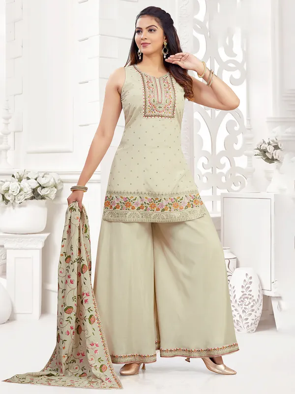 Beige silk palazzo suit with printed dupatta