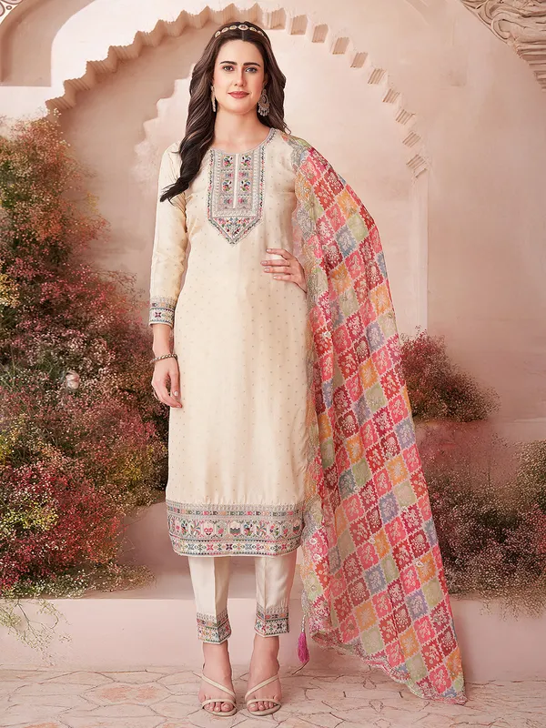 Beige silk salwar suit with multicolor dupatta