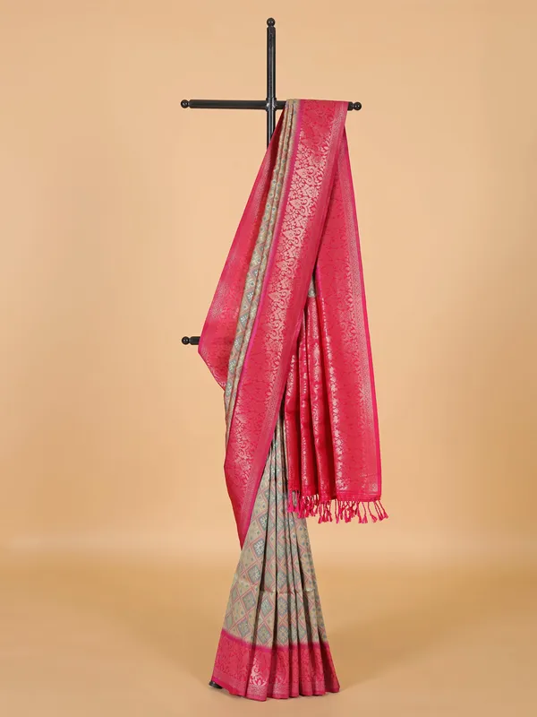 Beige silk saree with bold magenta border