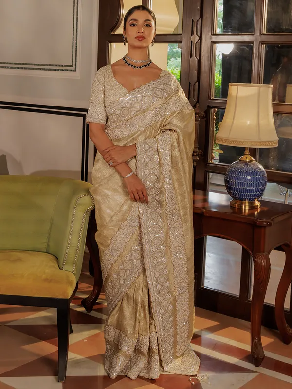 Beige silk saree with sequins work