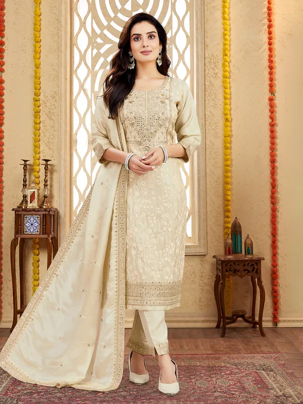Beige silk suit with zardosi and sequin charm