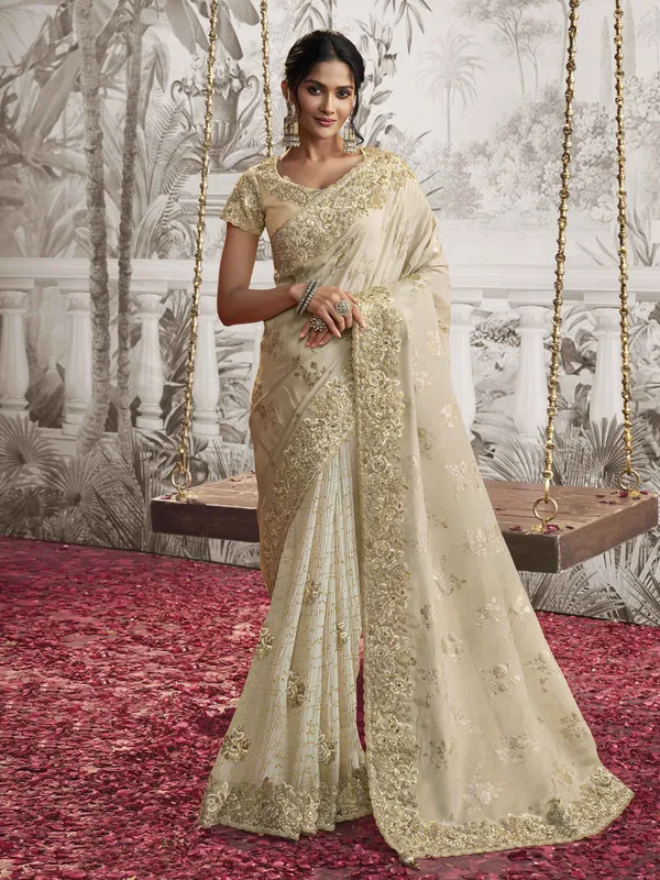Beige silk wedding and festive wear saree for women