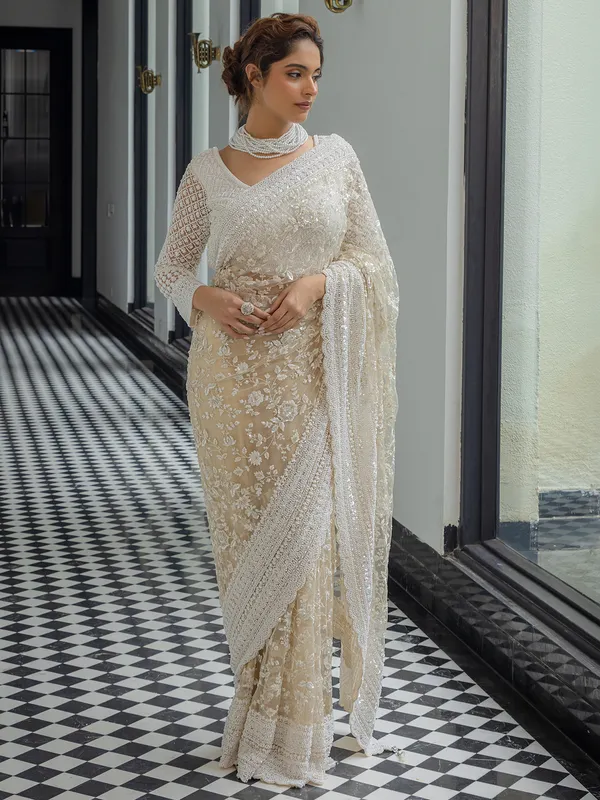 Beige wedding wear saree in soft net
