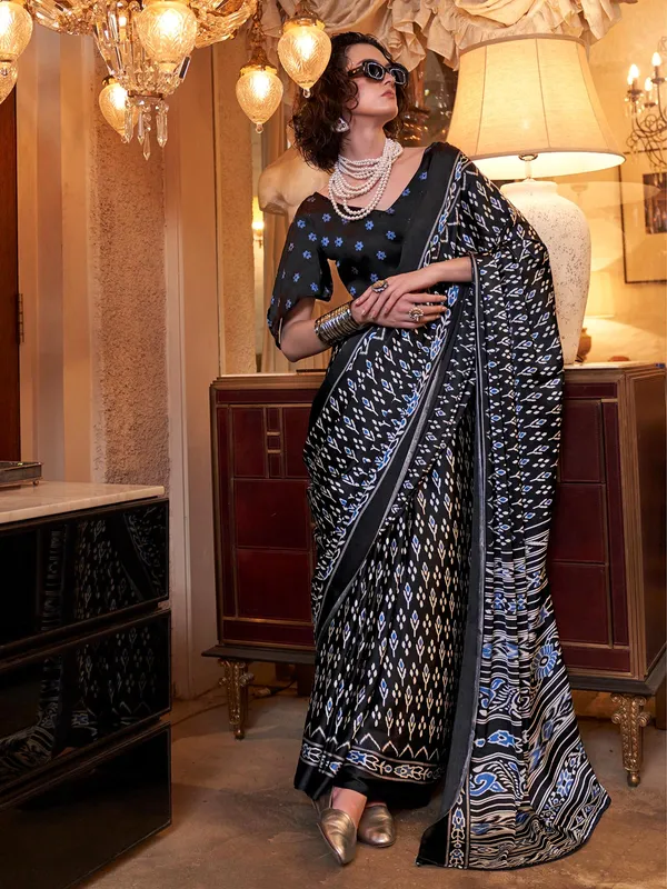 Black and blue crepe saree in patola print