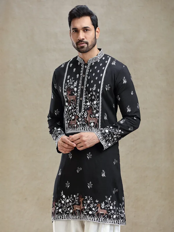 Black kurta salwar set in unique embroidery pattern