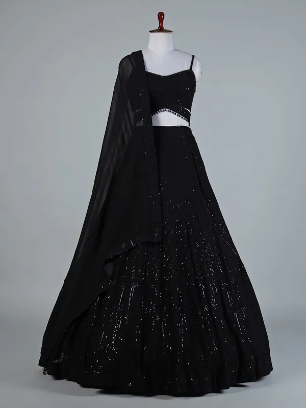 Black lehenga choli dupatta ensemble for women