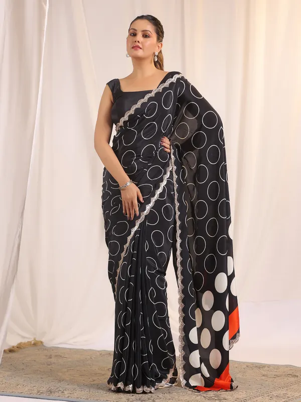 Black printed crepe silk saree with unstitched blouse
