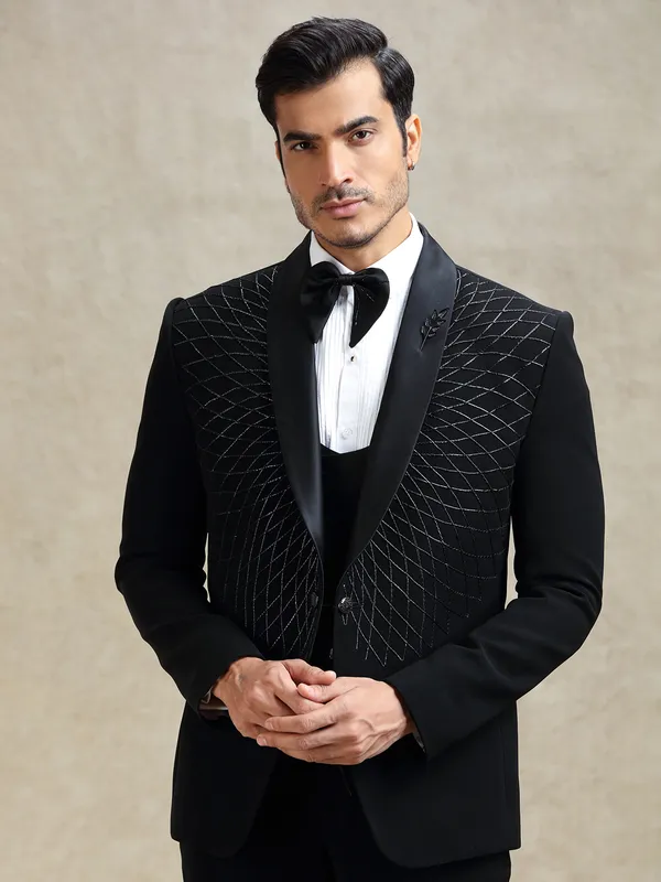 Black reception wear tuxedo suit in cutdana work