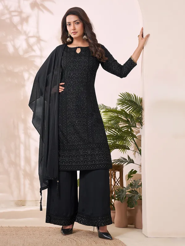 Black silk palazzo suit with keyhole neckline